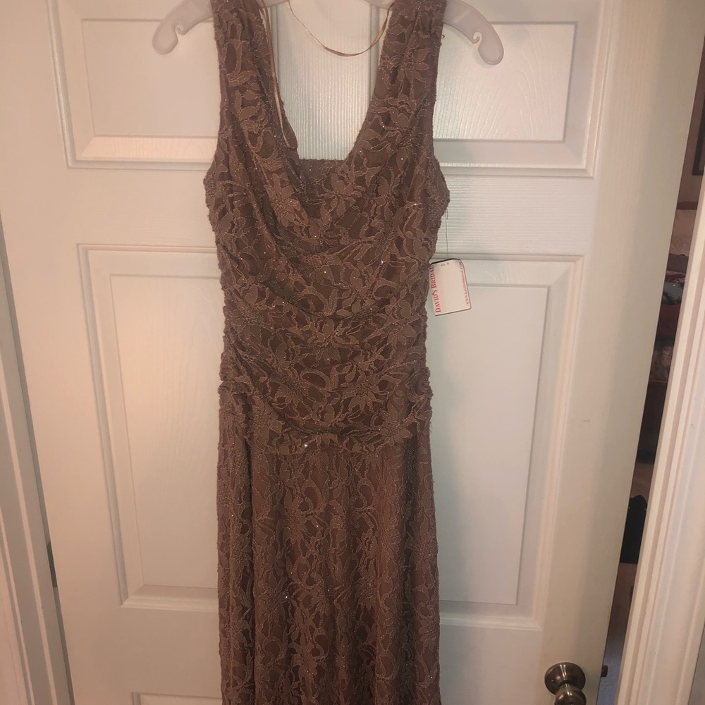 New with tags formal dress. Size 6.